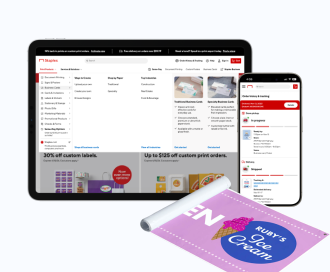 Tablet device showing Staples print top navigation, cellphone showing order status tracker, and a photo of a banner